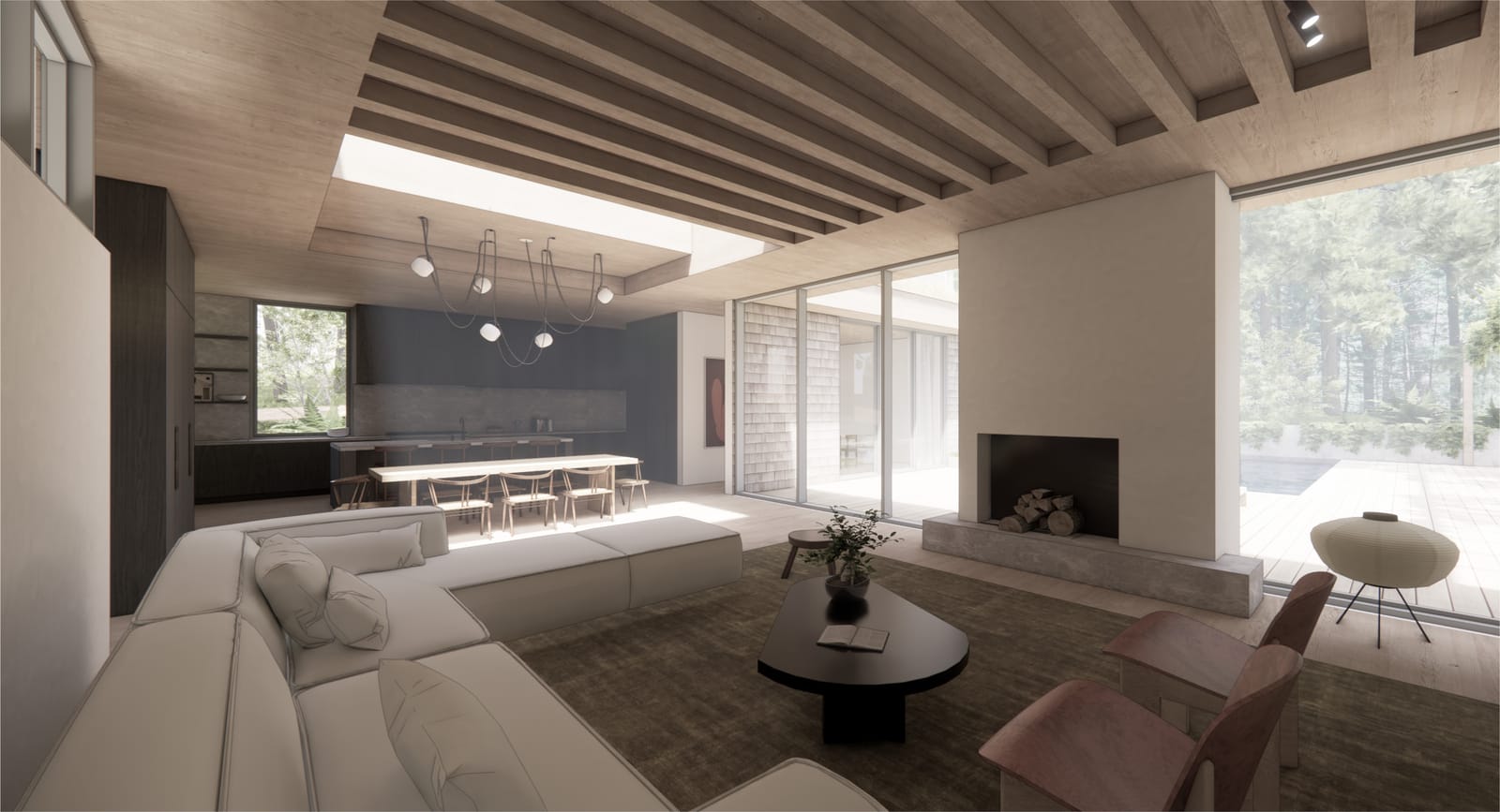 Living room with fireplace, skylight and view to the kitchen