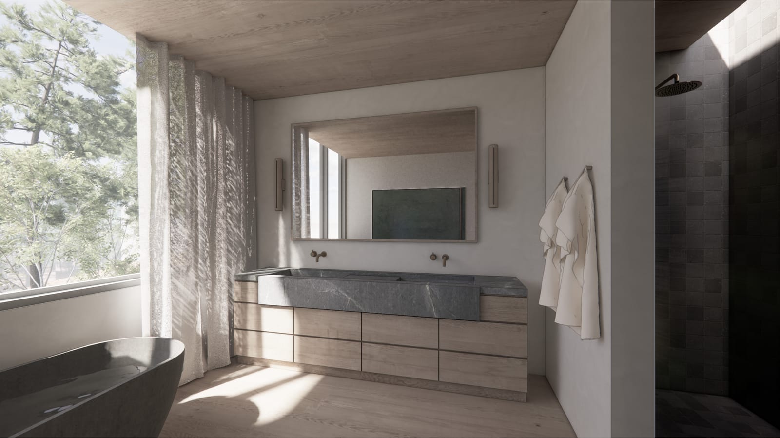 Double stone vanity below a wide mirror