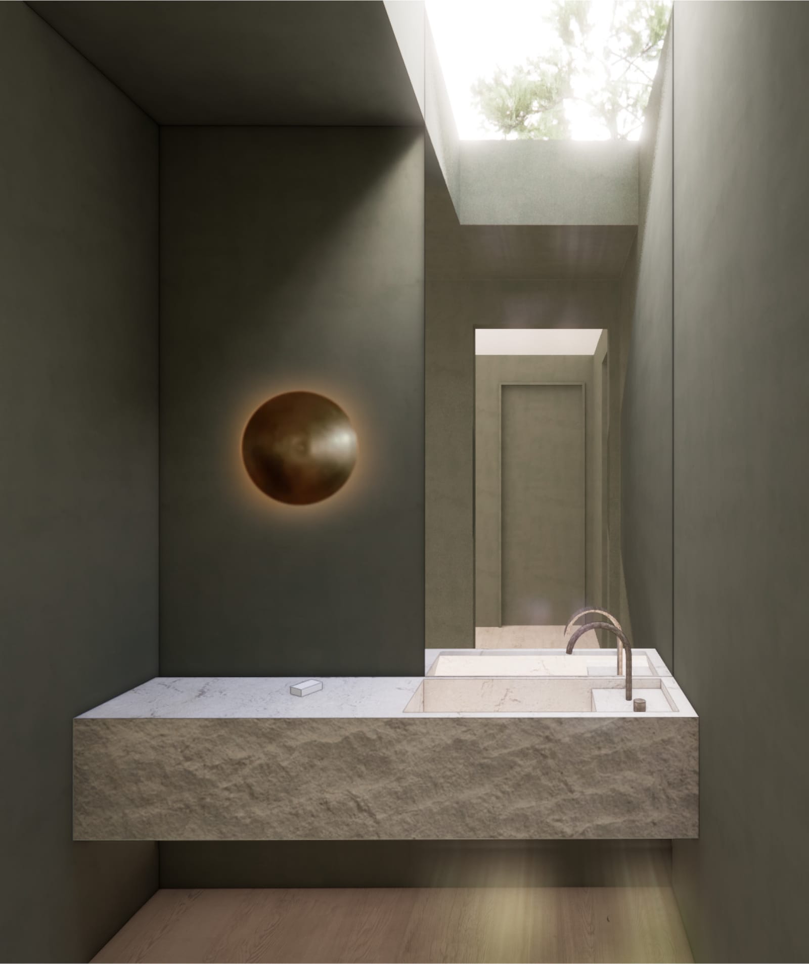 Powder room with stone sink and bronze sconce