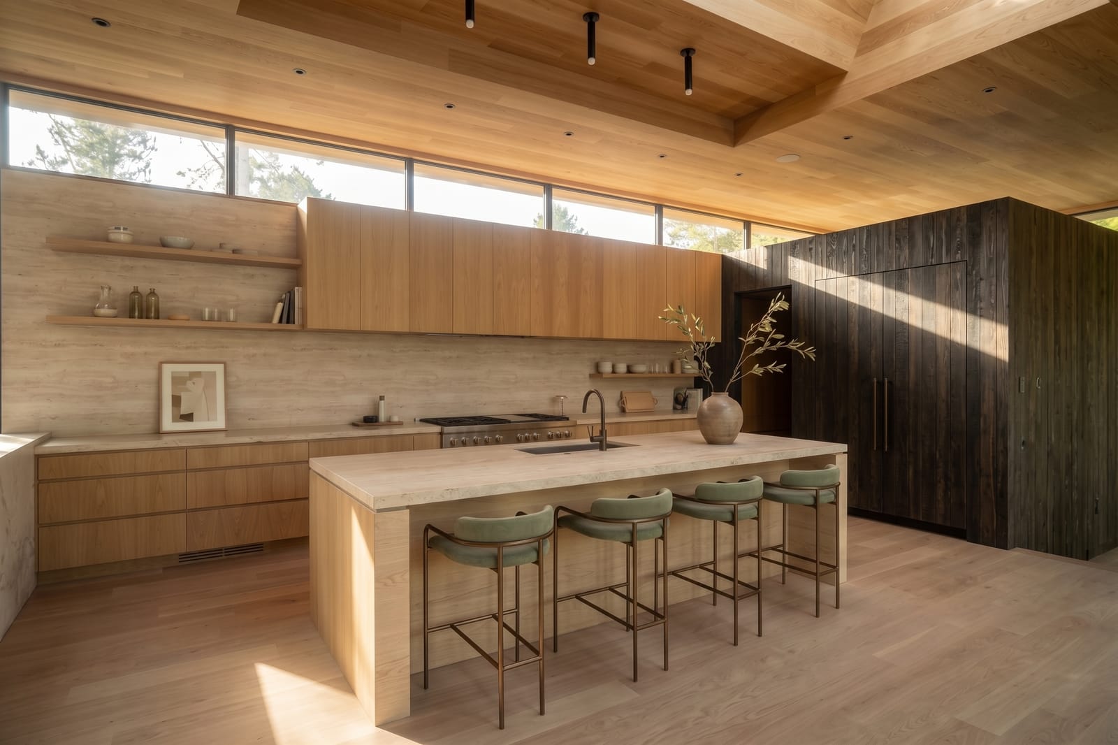 Kitchen with white oak cabinetry, stone island and a dark wood volume beside the skylit ceiling